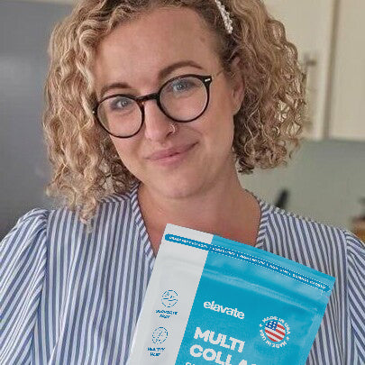 Woman with curly blonde hair and glasses holding a turquoise packet labeled 'elavate MULTI COLL' with a USA badge.