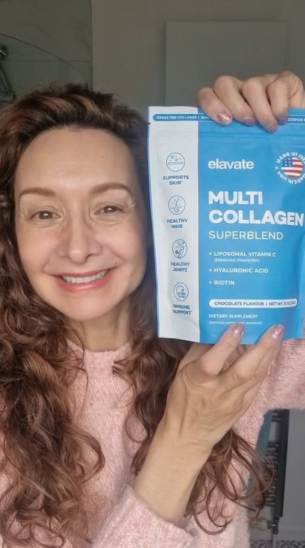 Woman smiling holding elavate MULTI COLLAGEN SUPERBLEND pouch listing HYALURONIC ACID, BIOTIN, CHOCOLATE FLAVOUR